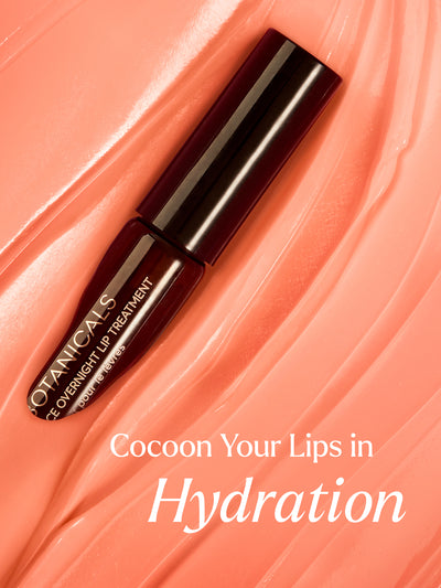 The image features True Botanicals' Pure Radiance Overnight Lip Treatment presented against a backdrop of smooth, glossy pink textures that mimic the appearance of hydrated lips. The text "Cocoon Your Lips in Hydration" emphasizes the product's nourishing and moisturizing benefits. The luxurious, deep maroon packaging contrasts beautifully with the soft pink tones, highlighting the product's premium appeal. This composition evokes a sense of indulgence and care.
